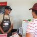 An OSU Extension Master Gardener volunteer answers gardening questions at the Master Gardener display at the Oregon State Fair.  Credit: Alyson Yates